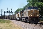 Loaded coal train rolls east